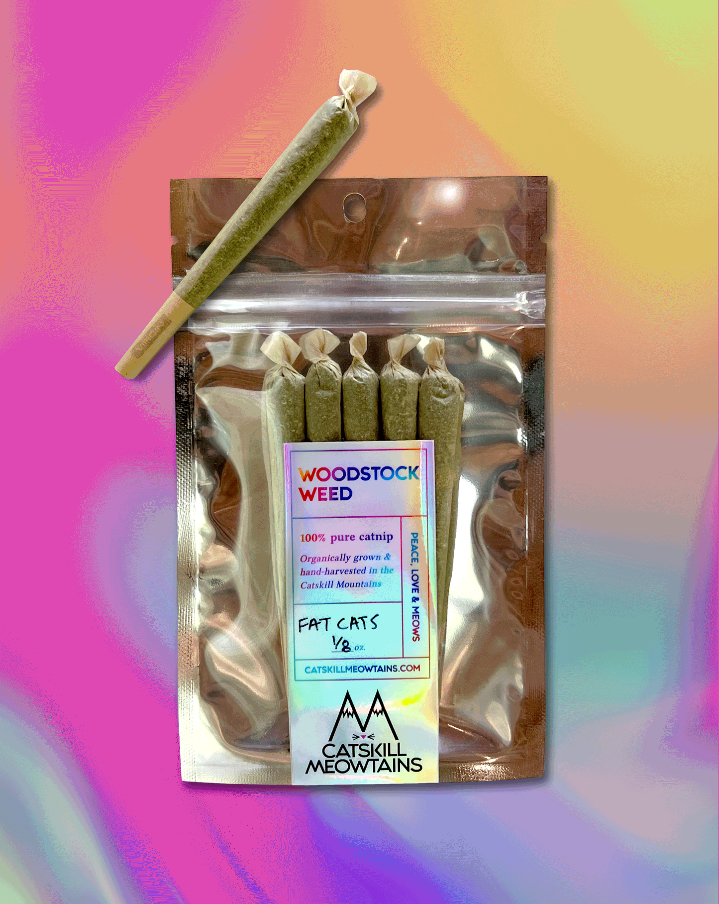 Animated gif of a cat’s paw reaching for a package of Catskill Meowtains Woodstock Weed Fat Cats (Six pre-rolled catnip joints, filled with organically grown, hand-harvested catnip.)